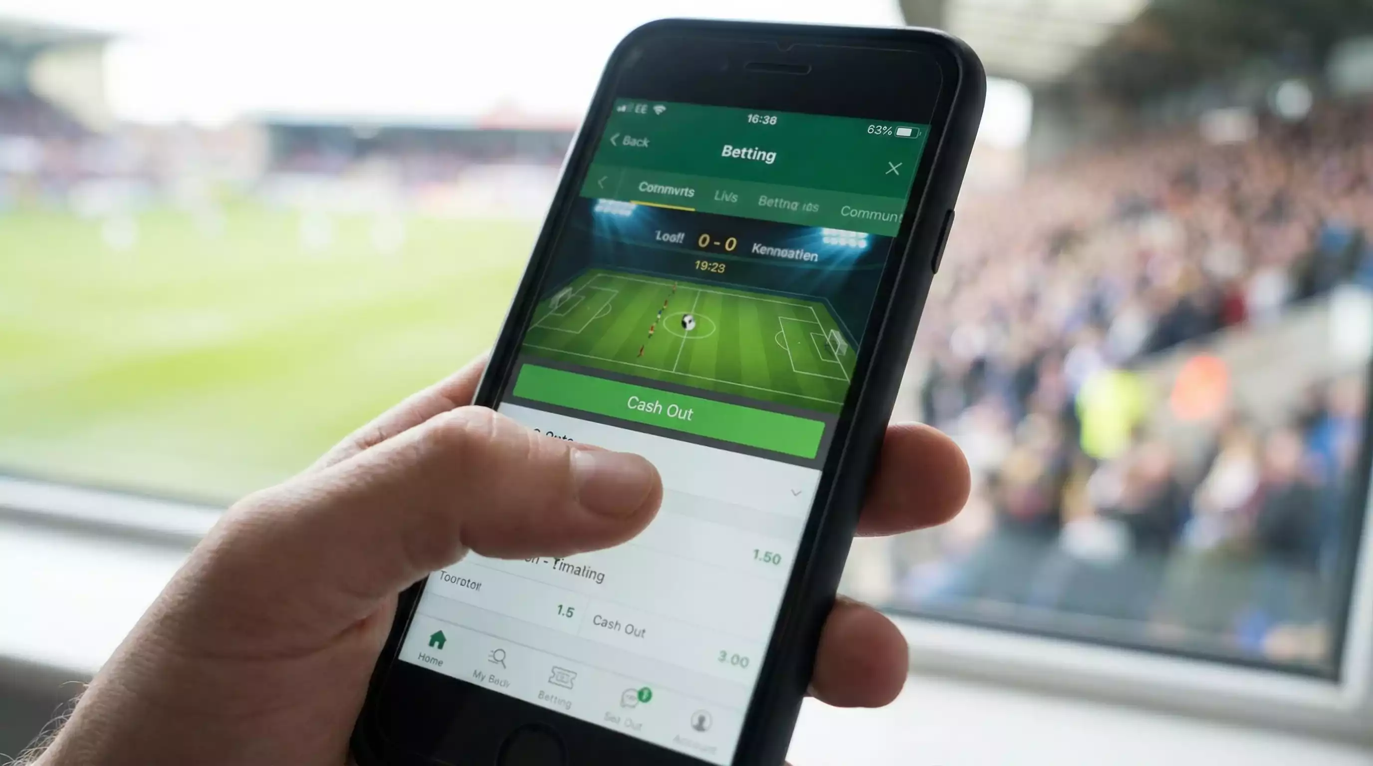 Pantalla de aplicación móvil mostrando opción de cash out en apuesta activa